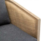 Fauteuil pivotant avec détails en rotin