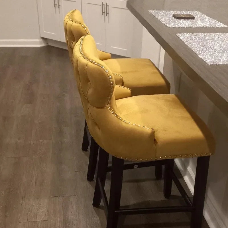 Tabouret de comptoir à dossier haut en velours