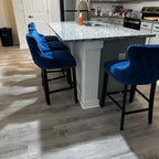 Tabouret de comptoir à dossier haut en velours