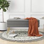 Banc de rangement ottoman en velours avec pieds en métal
